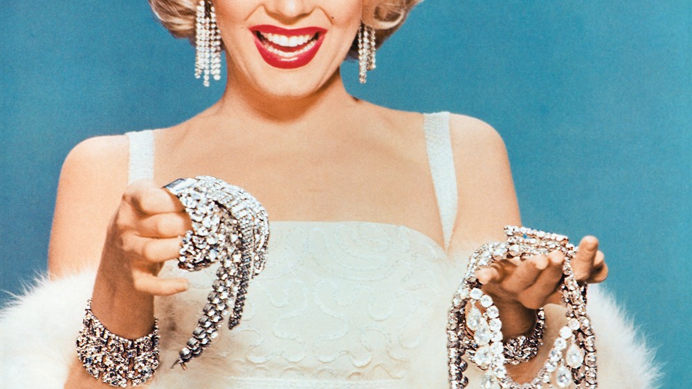 Diamonds are a girl's best friend, even when they're faux. Marilyn Monroe dripping in gems in the new book "Costume Jewelry," by Carol Woolton.
