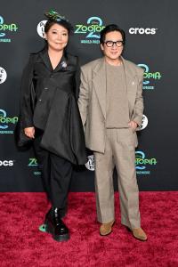 Echo Quan and Ke Huy Quan at Disney's "Zootopia 2" Premiere held at El Capitan Theatre on November 13, 2025 in Los Angeles, California.
