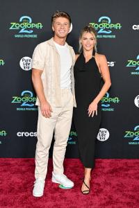 Robert Irwin and Witney Carson at Disney's "Zootopia 2" Premiere held at El Capitan Theatre on November 13, 2025 in Los Angeles, California.