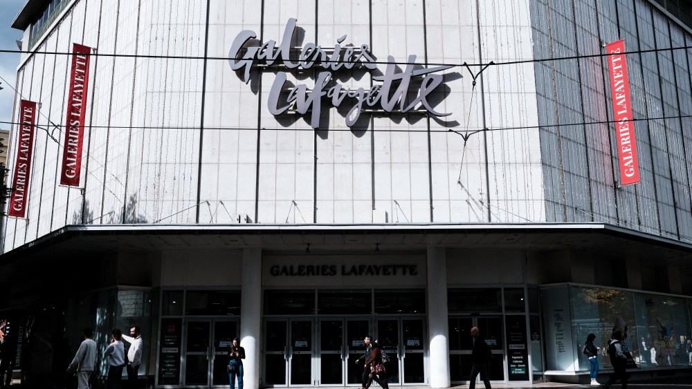Passers by walk past the building housing Galeries Lafayette in Grenoble which in the coming months will welcome one of six permanent physical stores belonging to Chinese ready to wear giant Shein on Saturday 4 October 2025.
Des passants longent le batiment abritant les Galeries Lafayette de Grenoble qui va accueillir dans les prochains mois l un des six magasins physiques perennes du geant chinois du pret a porter Shein le samedi 4 octobre 2025. (Photo by Benoit Pavan / Hans Lucas via AFP) (Photo by BENOIT PAVAN/Hans Lucas/AFP via Getty Images)