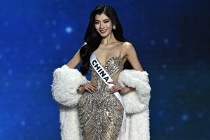 Miss China Zhao Na takes part in the final competition of the 2025 Miss Universe pageant in Nonthaburi, north of Bangkok, on November 21, 2025. (Photo by Lillian SUWANRUMPHA / AFP) (Photo by LILLIAN SUWANRUMPHA/AFP via Getty Images)