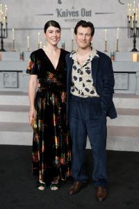Allison Bennett and Noah Segan at Netflix's "Wake Up Dead Man: A Knives Out Mystery" premiere held at the Academy Museum of Motion Pictures on November 17, 2025 in Los Angeles, California.