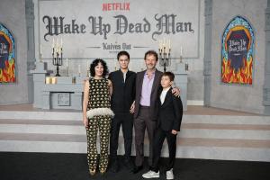 Limor Diamant and Ram Bergman and family at Netflix's "Wake Up Dead Man: A Knives Out Mystery" premiere held at the Academy Museum of Motion Pictures on November 17, 2025 in Los Angeles, California.