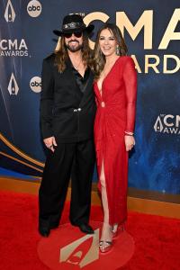 Billy Ray Cyrus and Elizabeth Hurley at The 59th Annual CMA Awards held at the Bridgestone Arena on November 19, 2025 in Nashville, Tennessee.