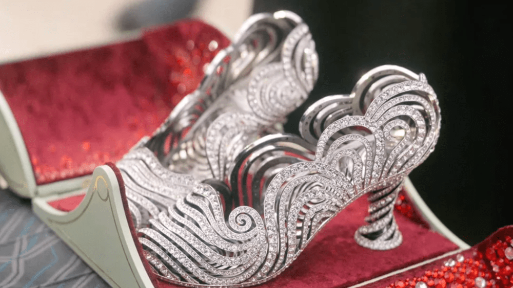 A spiraling, bejeweled silver pump is featured in Wicked: For Good.