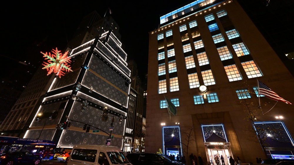 Louis Vuitton, Tiffany's and the giant snowflake on Fifth Avenue at night.