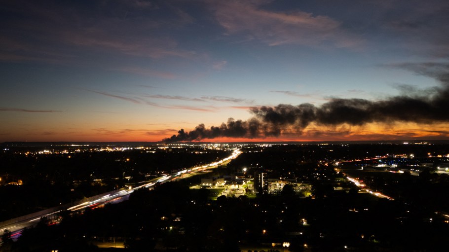 Smoke rises from the site of a cargo plane crash near the UPS Worldport at Louisville Muhammad Ali International Airport in Louisville, Ky., on Nov. 4, 2025.
