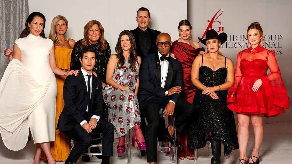 FGI Dallas honorees Joseph Altuzarra, left front, and Corey Damen Jenkins, center front, with presenters and other event officials.