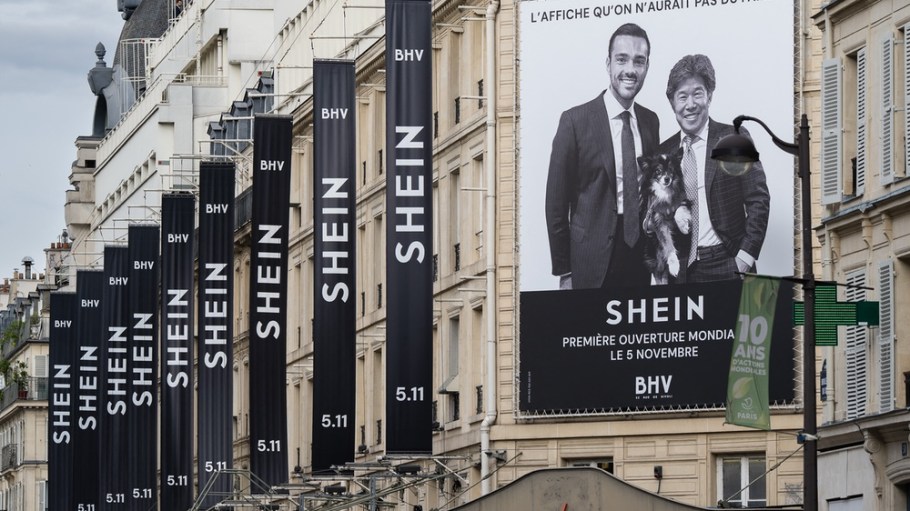 Frederic Merlin CEO of Societe des Grands Magasins and Donald Tang CEO of Shein on a poster displayed on the exterior walls of BHV on the day of the inauguration of the new Shein store on the sixth floor of BHV in Paris France on Nov. 5, 2025.