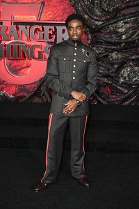 Caleb McLaughlin at the "Stranger Things" Season 5 World Premiere held at the TCL Chinese Theatre on November 06, 2025 in Los Angeles, California.
