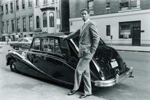 Luxury was a hallmark of Andre Leon Talley’s style. In 1979 serving as Women’s Wear Daily’s Paris Bureau Chief, he was photographed standing confidently beside a luxury car on the streets of New York. His poised stance captured both his commanding presence in fashion and the world that inspired him.