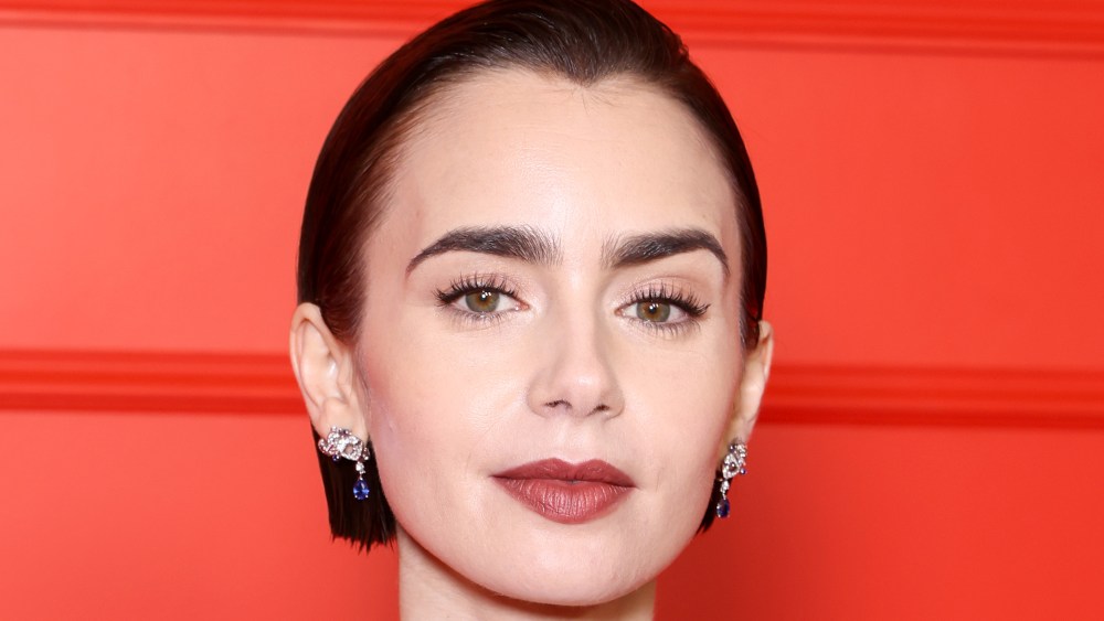 PARIS, FRANCE - DECEMBER 15: Lily Collins attends the "Emily In Paris" - Season Five - Netflix Paris Premiere at Le Grand Rex on December 15, 2025 in Paris, France. (Photo by Pascal Le Segretain/Getty Images)