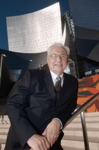 LOS ANGELES - OCTOBER 20:  Architect Frank Gehry stands outside his newest creation, the Walt Disney Concert Hall October 20, 2003 in Los Angeles, California. The 2,265-seat hall will be home to the Master Chorale, the Music Center of Los Angeles County and the Los Angeles Philharmonic. The 293,000 square foot facility was conceived in 1987 with a $50 million gift from Walt Disney's widow, Lillian Disney, who made the donation as a tribute to her late husband and his dedication to the arts.  (Photo by Bob Riha, Jr./Walt Disney Concert Hall via Getty Images)