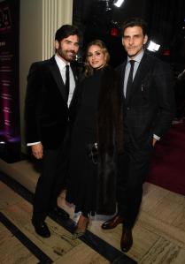 Michael Atmore, Olivia Palermo and Johannes Huebl at the 2025 Footwear News Achievement Awards held at Cipriani 25 Broadway on December 03, 2025 in New York, New York.