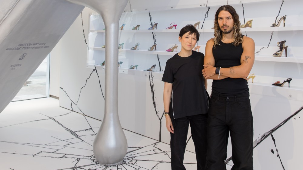 Sandra Choi, Harry Nuriev, and the giant Jimmy Choo pump, created for Miami Art Week.