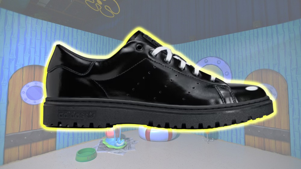 a new adidas stan smith spongebob shoe in black, with a yellow glow outline, overlaid on a replica of spongebob's home