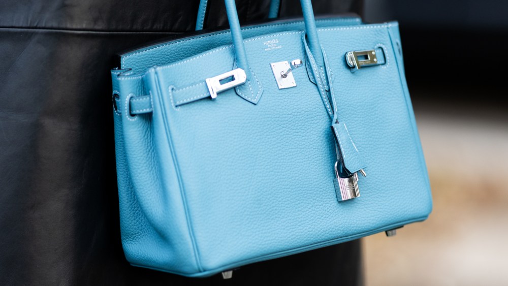 Lisa Kistermann wears a black leather long coat and carries a structured Hermes turquoise handbag on November 20, 2025 in Milan, Italy. (Photo by Valentina Frugiuele/Getty Images)