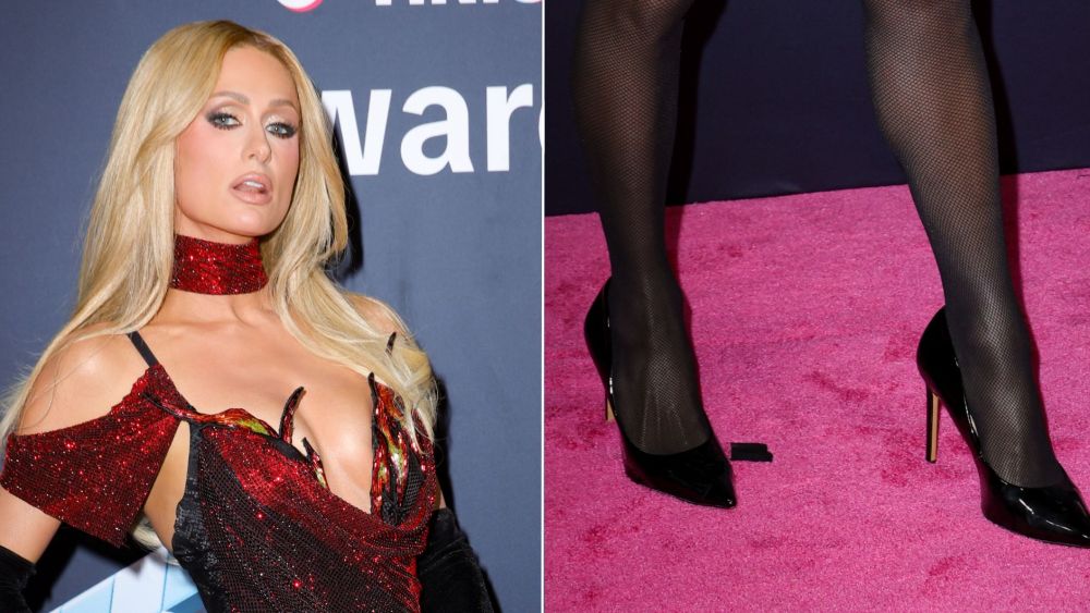 Paris Hilton wears glossy black patent leather pumps to the TikTok Awards on Thursday, where Hilton served as a presenter and was honored with the first-ever "Muse of the Year" award.