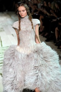 A model on the runway at Alexander McQueen's spring 2011 show. Designed by Sarah Burton. (Photo by Giovanni Giannoni/WWD/Penske Media via Getty Images)