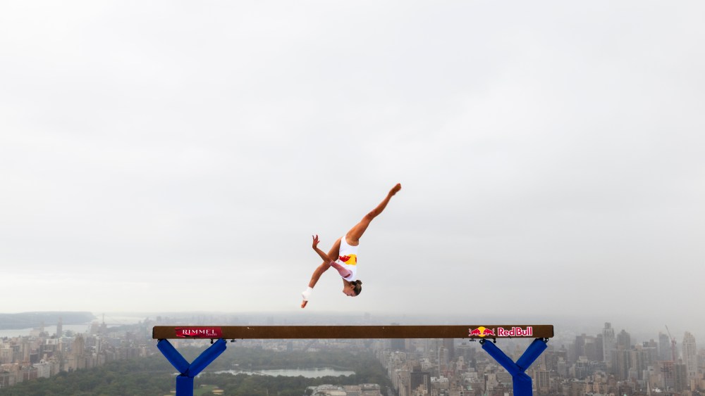 Red Bull gymnast Lily Smith performs on a high-rise balance beam for Rimmel London.
