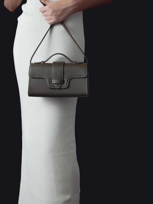 Melina Bucher, Loué Studio (pictured), Kaila Katherine, Via Gallo, and Watch and Strap unveil their first luxury, sustainable items using Uncaged’s plant-protein leather.