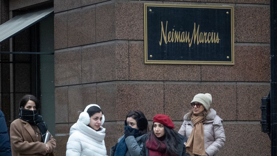 Pedestrians walk past a Neiman Marcus store on December 30, 2025 in Chicago, Illinois.