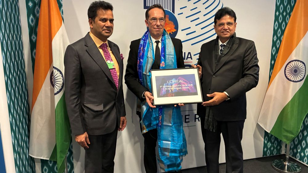 Sanjay Kumar, Nicolas Hieronimus and Sridhar Babu at Davos