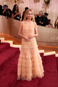 Justine Lupe at the 83rd Annual Golden Globes held at The Beverly Hilton on January 11, 2026 in Beverly Hills, California.