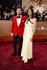 Adam Scott and Naomi Scott at the 83rd Annual Golden Globes held at The Beverly Hilton on January 11, 2026 in Beverly Hills, California.
