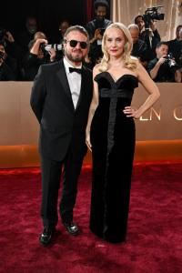 Brady Corbet and Mona Fastvold at the 83rd Annual Golden Globes held at The Beverly Hilton on January 11, 2026 in Beverly Hills, California.