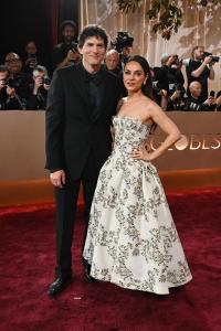 Ashton Kutcher and Mila Kunis at the 83rd Annual Golden Globes held at The Beverly Hilton on January 11, 2026 in Beverly Hills, California.