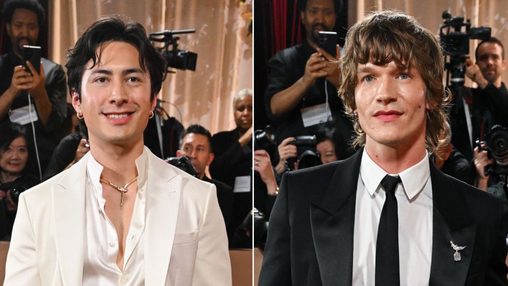 Hudson Williams in Armani and Connor Storrie in Saint Laurent on the Golden Globes 2026 red carpet.