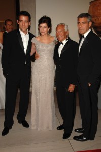 Clive Owen, actress Julia Roberts, fashion designer Giorgio Armani and actor George Clooney attend the Metropolitan Museum of Art's annual Costume Institute gala in New York City. All wear Armani.
