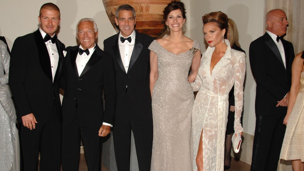David Beckham, fashion designer Giorgio Armani, actor George Clooney and Victoria Beckham attend the Metropolitan Museum of Art's annual Costume Institute gala in New York City. All wear Armani.