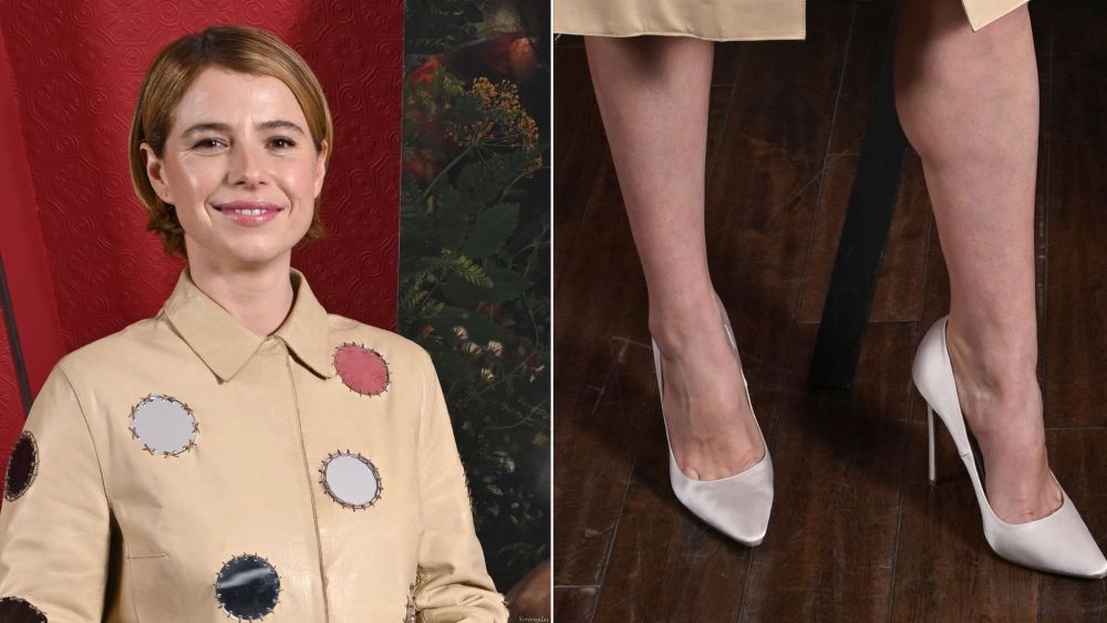 Jessie Buckley attended a Q&A screening for "Hamnet" in London on Friday, pairing white satin Jimmy Choo Romy Pumps with a vintage fall 1999 Prada skirt set.