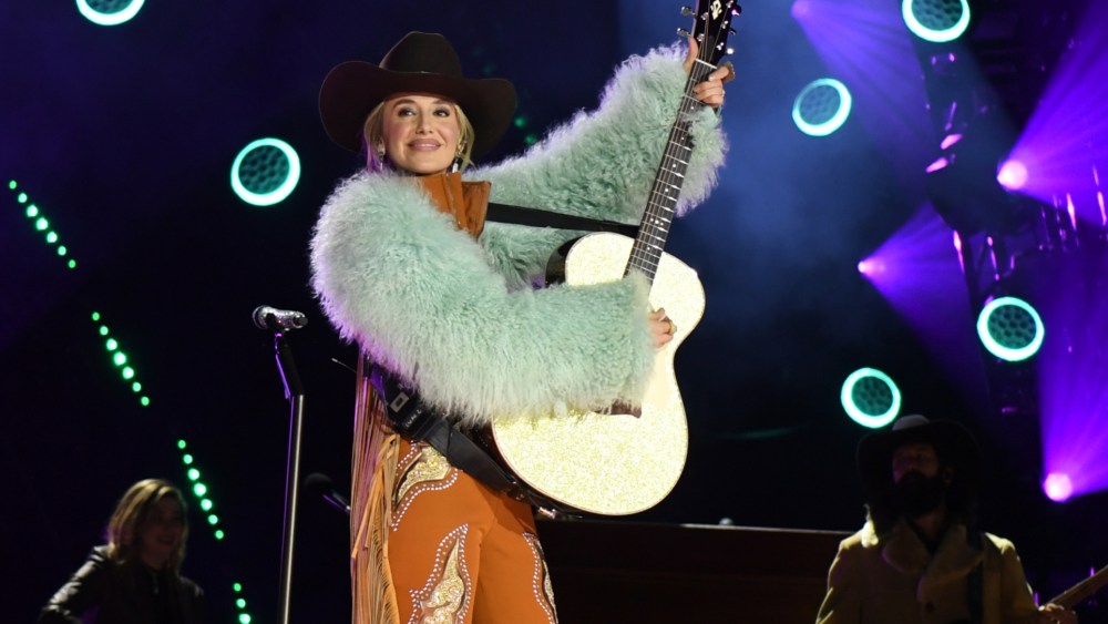 Lainey Wilson wears a western-inspired ski suit by Sarah Jameson and Raina Gir onstage during New Year's Eve Live: Nashville's Big Bash on Dec. 31, 2025 in Nashville, Tenn.