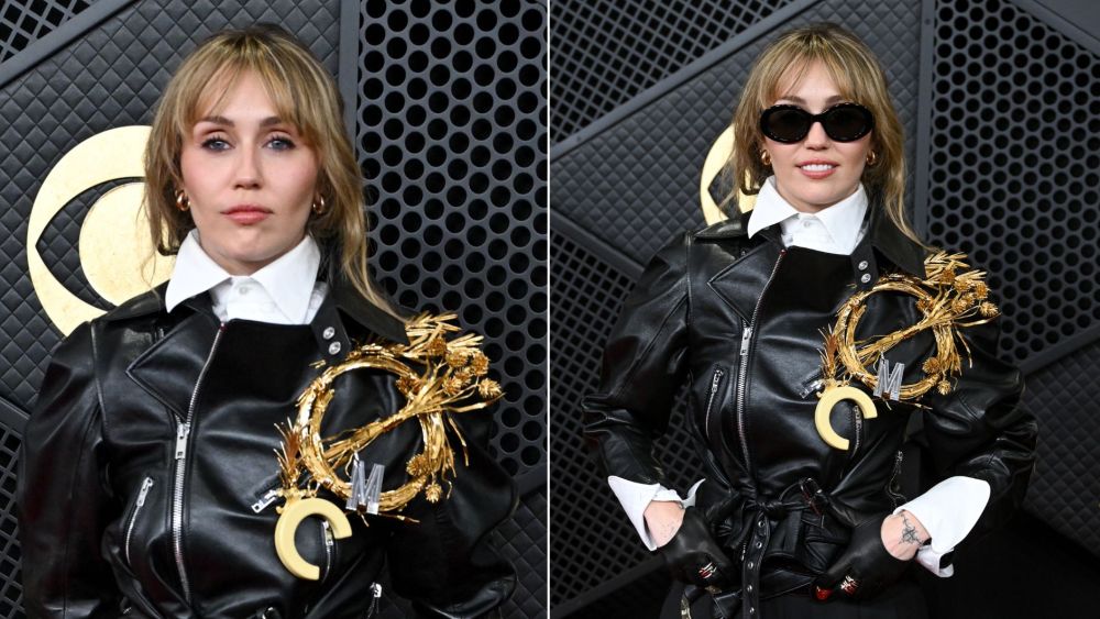 Miley Cyrus brought moto punk tailoring to the 2026 Grammys red carpet in a Celine look complete with a leather jacket, pleated pants and a massive, wreath-like brooch featuring her initials.