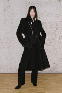 Backstage at Sacai Fall 2026 Ready-to-Wear Collection at Paris Fashion Week