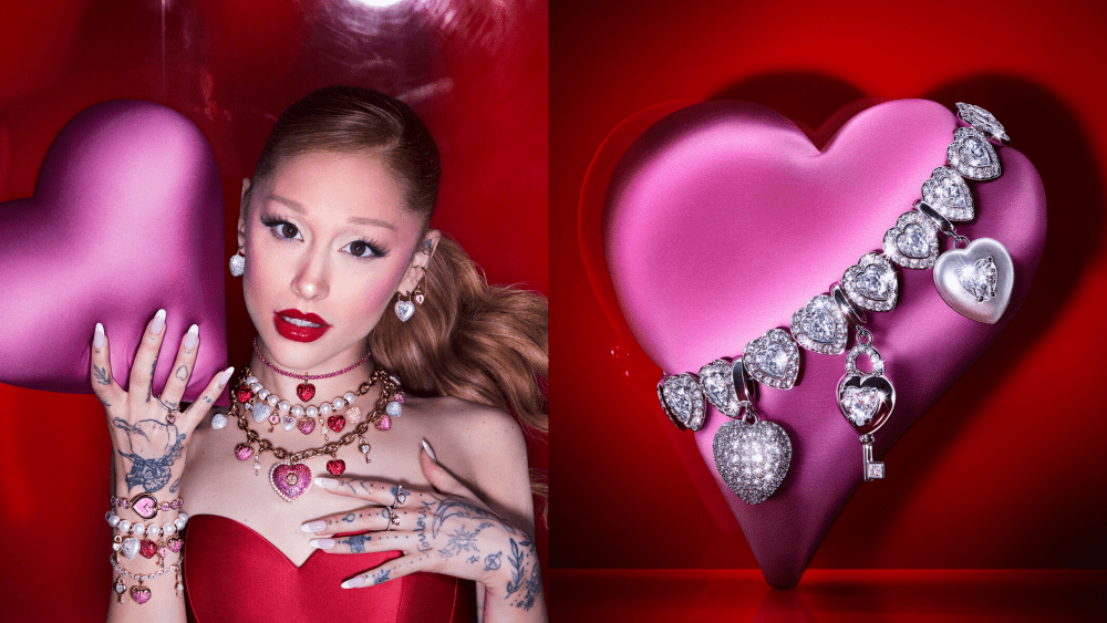 ariana grande wearing lots of swarovski charm necklaces and bracelets, shot for its valentine's day campaign; a puffy, satin heart dressed up with a chunky swarovski heart bracelet