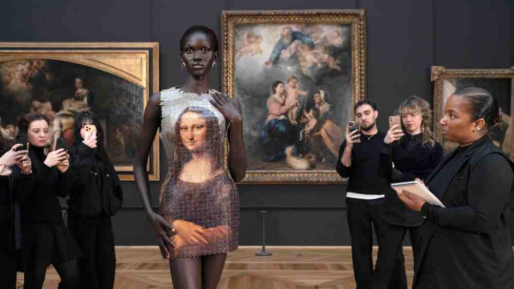 A couture look from Marine Serre's fall 2026 collection photographed at the Louvre museum