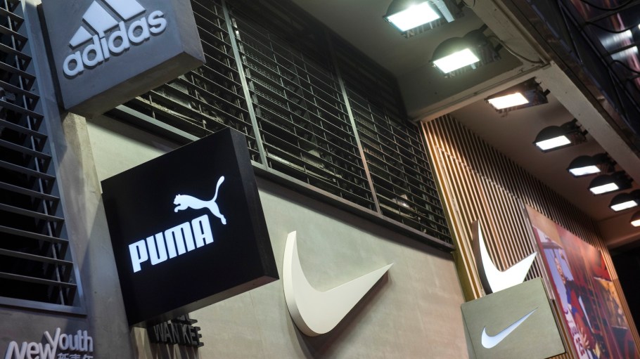 Multinational sport clothing brands Adidas, Puma and Nike logos seen at a store in Hong Kong.