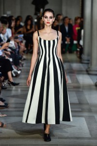A model on the runway in a striped evening dress from Carolina Herrera's spring 2017 ready to wear collection. (Photo by Giovanni Giannoni/Penske Media via Getty Images)