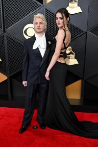 Andrew Watt and Charlotte Lawrence at the 68th GRAMMY Awards held at the Crypto.com Arena on February 01, 2026 in Los Angeles, California.