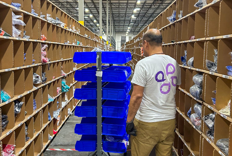 The apparel retailer is cutting 211 jobs as it exits its third-party fulfillment services and shutters L.A.- and Boston-area warehouses.