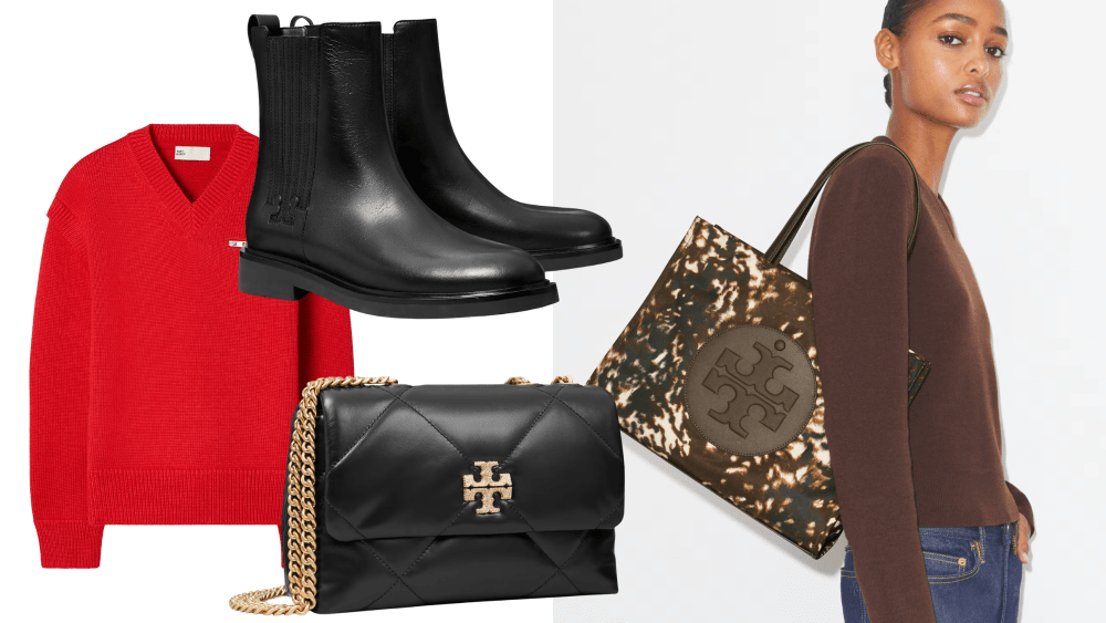 a red sweater, chelsea boots, and black quilted shoulder bag overlaid on an image of a model carrying tory burch's printed tote