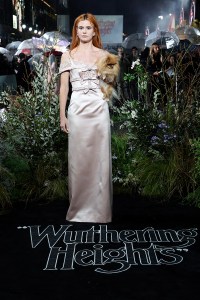 LONDON, ENGLAND - FEBRUARY 05: Alison Oliver and Bubble the dog attend the UK Premiere of "Wuthering Heights" at Odeon Luxe Leicester Square on February 05, 2026 in London, England. (Photo by Tristan Fewings/Getty Images for Warner Bros.)