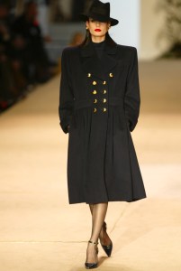 A model on the runway at Yves Saint Laurent's spring 2002 haute couture show at the Pompidou Centre in Paris. Spring 2002 haute couture marked the house's final collection with Yves Saint Laurent as creative director.