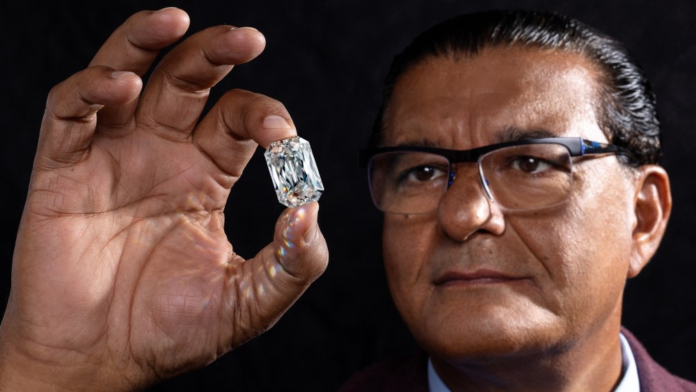 Jacob Arabo examining an Angel-cut diamond.