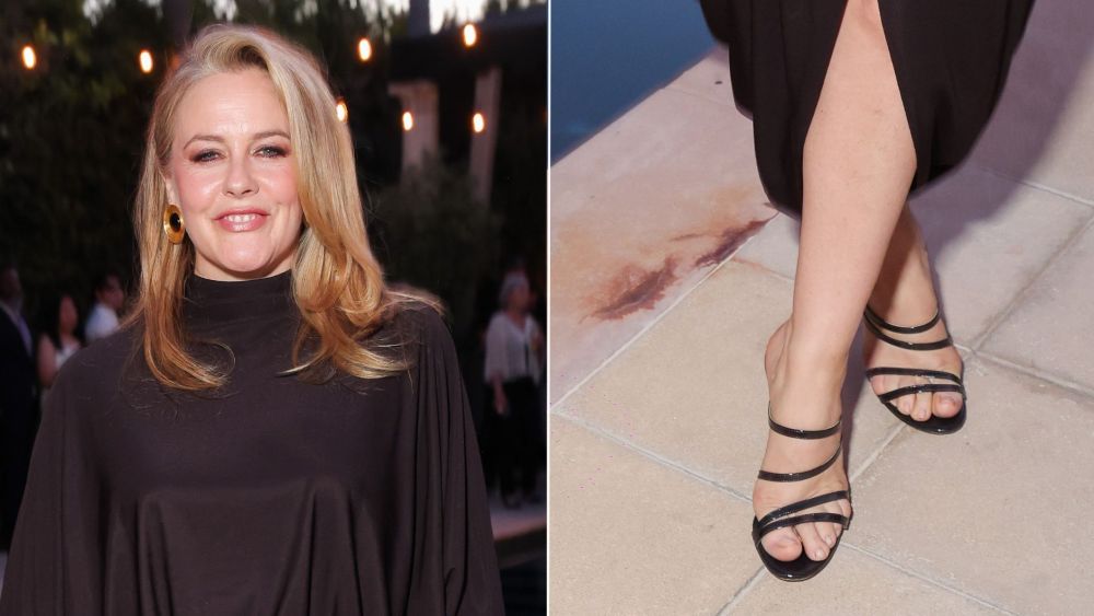 Alicia Silverstone wearing black strappy sandal mules at the 2026 WIF Oscars Nominee Celebration on Friday night.