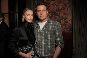 Charlize Theron and Jonathan Anderson at the Dior x System Cocktail party during Paris Fashion Week on March 03, 2026 in Paris, France.